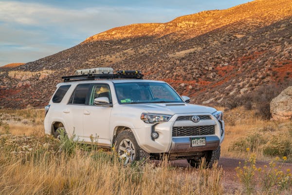 Toyota 4Runner SUV (2016 Trail Edition) at sunset in Red Mountain Open Space, fall scenery of Colorado