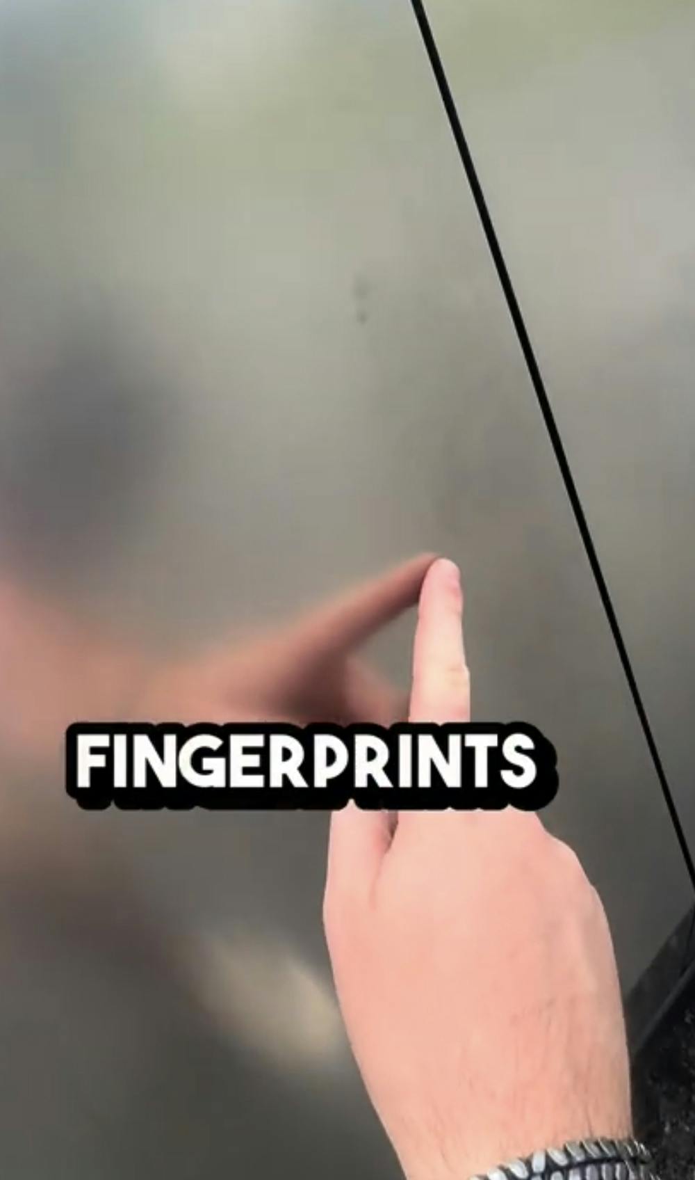 Finger pointing at door