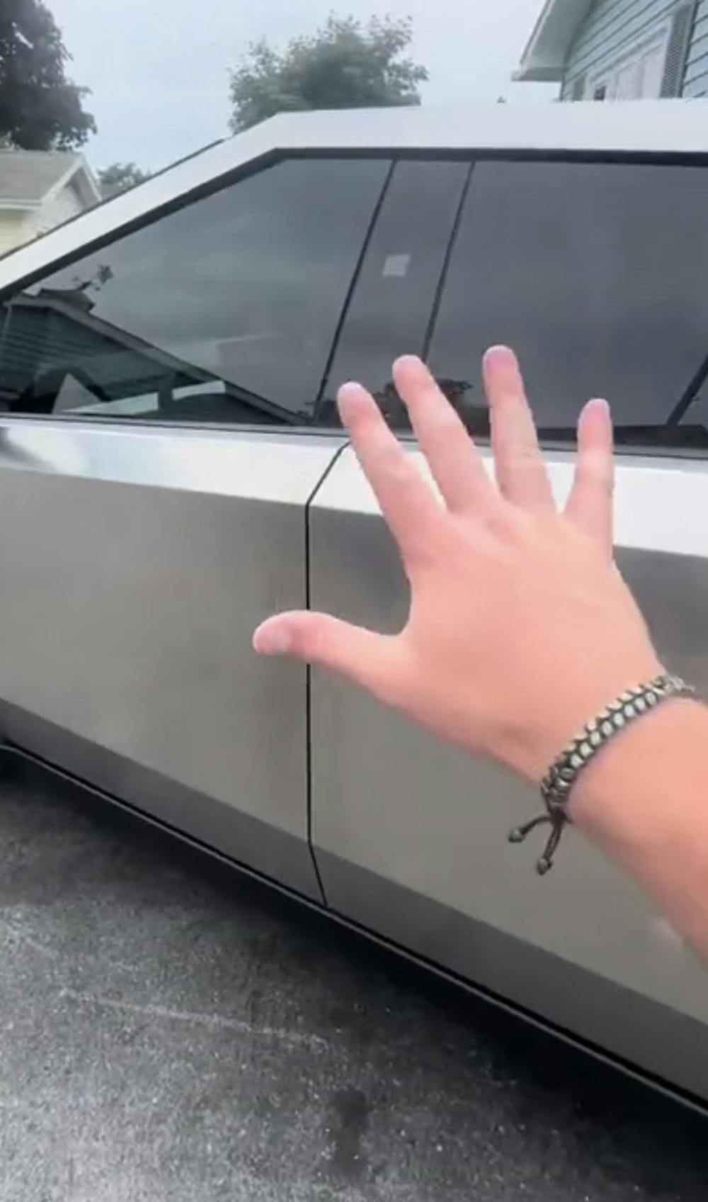 Hand in front of truck