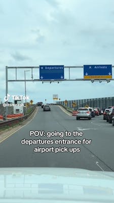 airport entrance with "departures" and "arrivals" lane, captioned "POV: going to the departures entrance for airport pick ups"