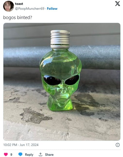 bogos binted with an alien-shaped bottle