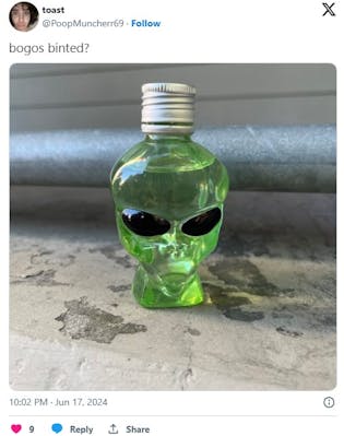 bogos binted with an alien-shaped bottle of tequila