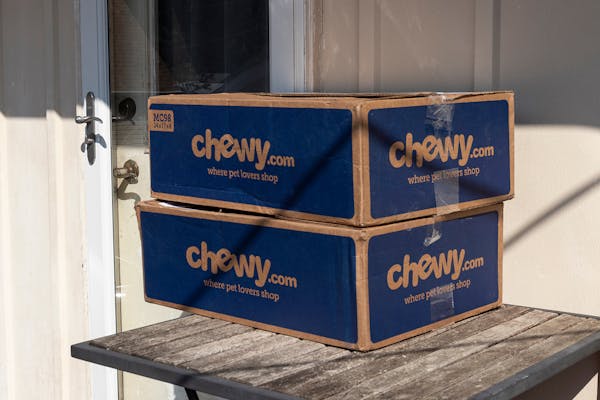 Chewy branded boxes on table