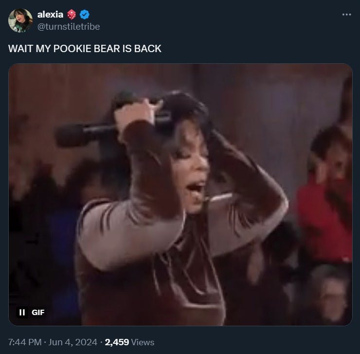 Oprah Winfrey screams in a reaction GIF in a tweet with the caption 'WAIT MY POOKIE BEAR IS BACK'