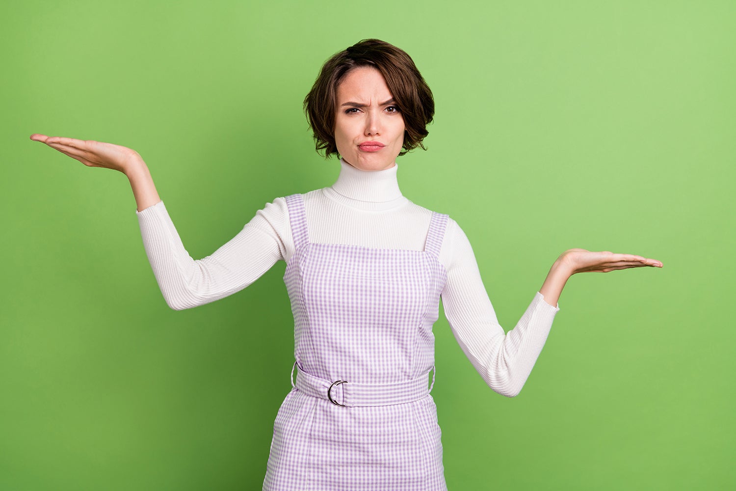 woman comparing empty space on palms