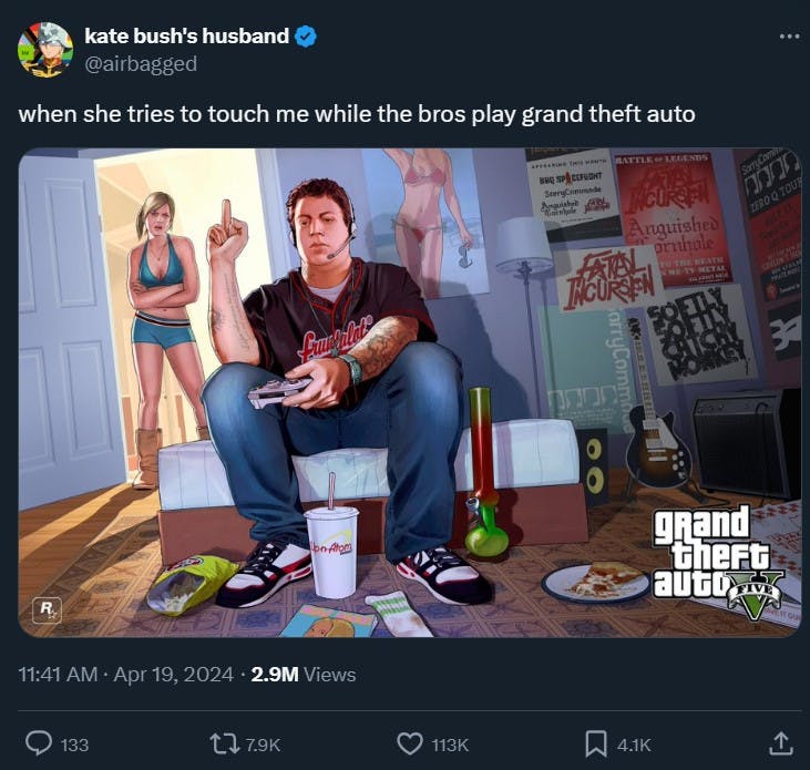 tweet featuring image of man giving wife middle finger as he plays video games with caption 'when she tries to touch me while the bros play grand theft auto'