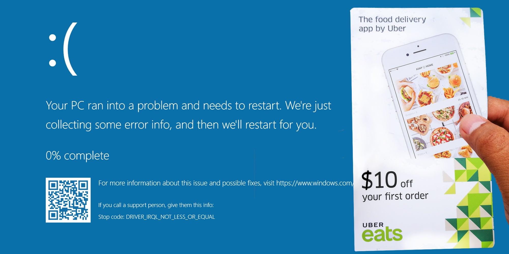 Hand Holding ubereats gift card over microsoft blue screen of death