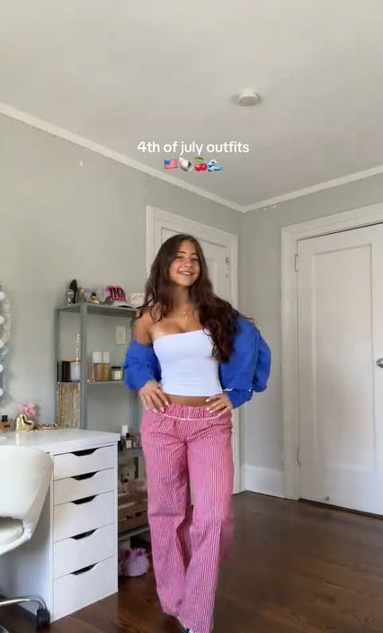 A young brunette woman showing off her outfit. Text overlay reads, '4th of july outfits'