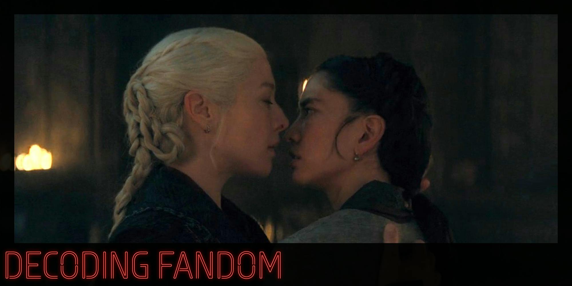 two women about to kiss. There is text in a Daily Dot newsletter web_crawlr font that says 'Decoding Fandom'