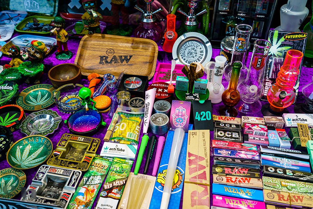 Amsterdam, Netherlands - 16 November, 2021: Cannabis smoking equipment for sale in shop. Recreational use of cannabis is allowed in some countries but not others