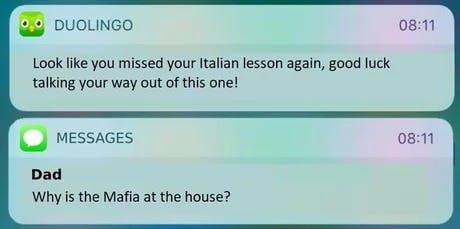 notifications that include a duolingo reminder about an italian lesson and a text from dad that says the mafia is at their house