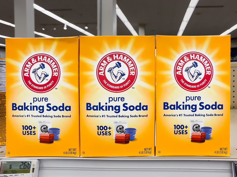 ATLANTA, GEORGIA - DECEMBER 6, 2023 : Arm and Hammer brand baking soda on grocery store shelf at a local supermarket.