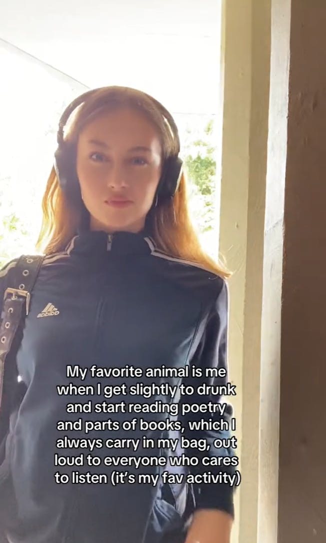 Blonde woman with big headphones on staring at the camera. Overlay text reads, “My favorite animal is me when I get slightly [too] drunk and start reading poetry and parts of books, which I always carry in my bag, out loud to everyone who cares to listen (it’s my fav activity).”