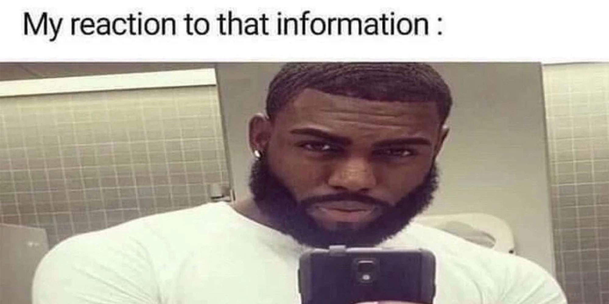 man taking selfie in bathroom with caption "my reaction to that information:"