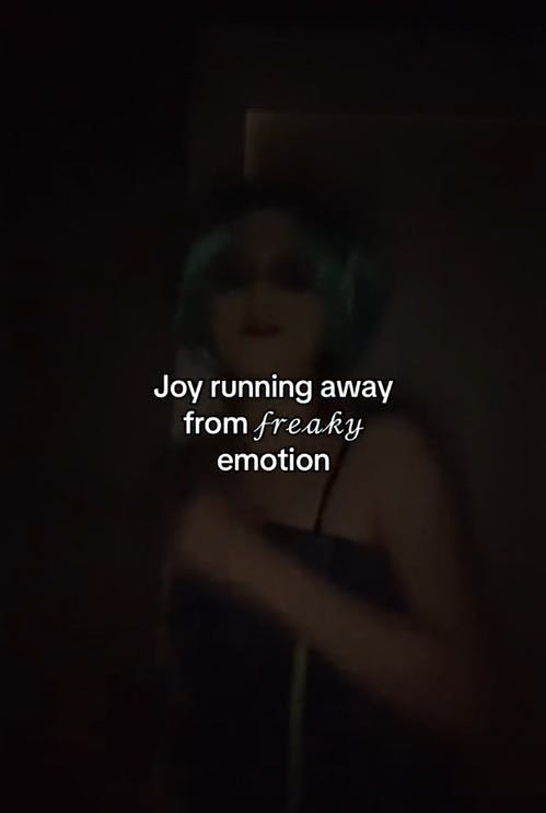 Riley it ok I'm Joy video with a woman dressed up as Joy.