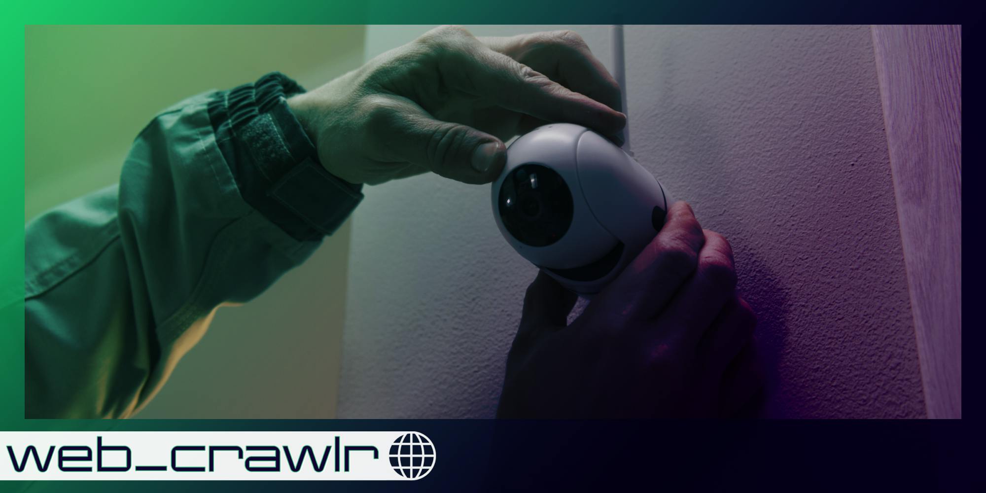 A person installing a video security camera. The Daily Dot newsletter web_crawlr logo is in the bottom left corner.