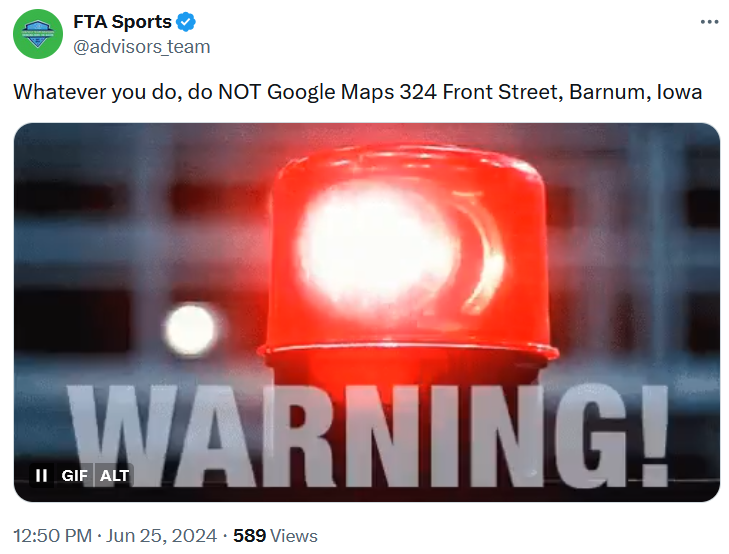 324 Front St Barnum Iowa meme with a flashing warning light.