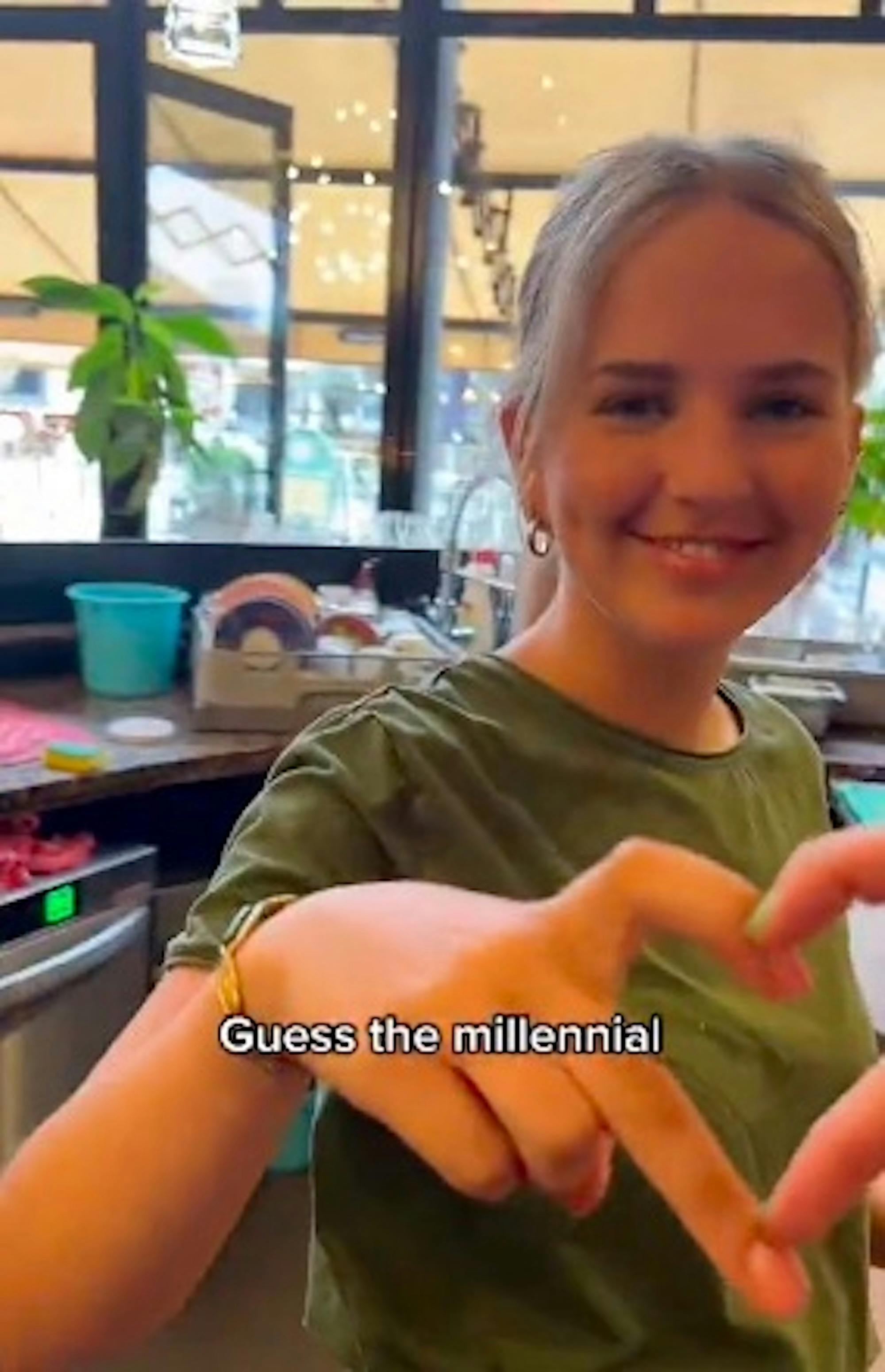 Screenshot from TikTok by user @zoii.tsa captioned, “Gen Z vs. millennial' showing heart hands shapes