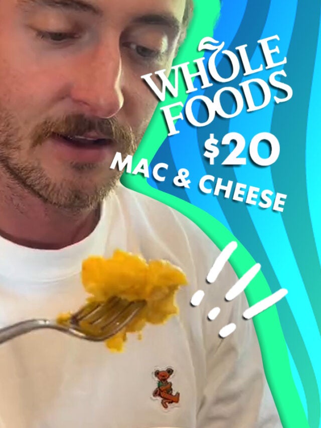 man with mac over blue and green