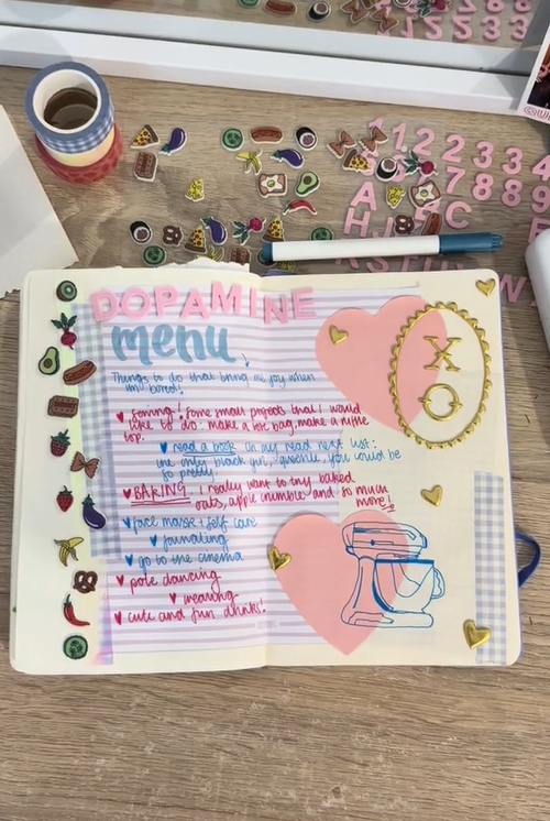 Dopamine menu craft video with paper hearts and food stickers.