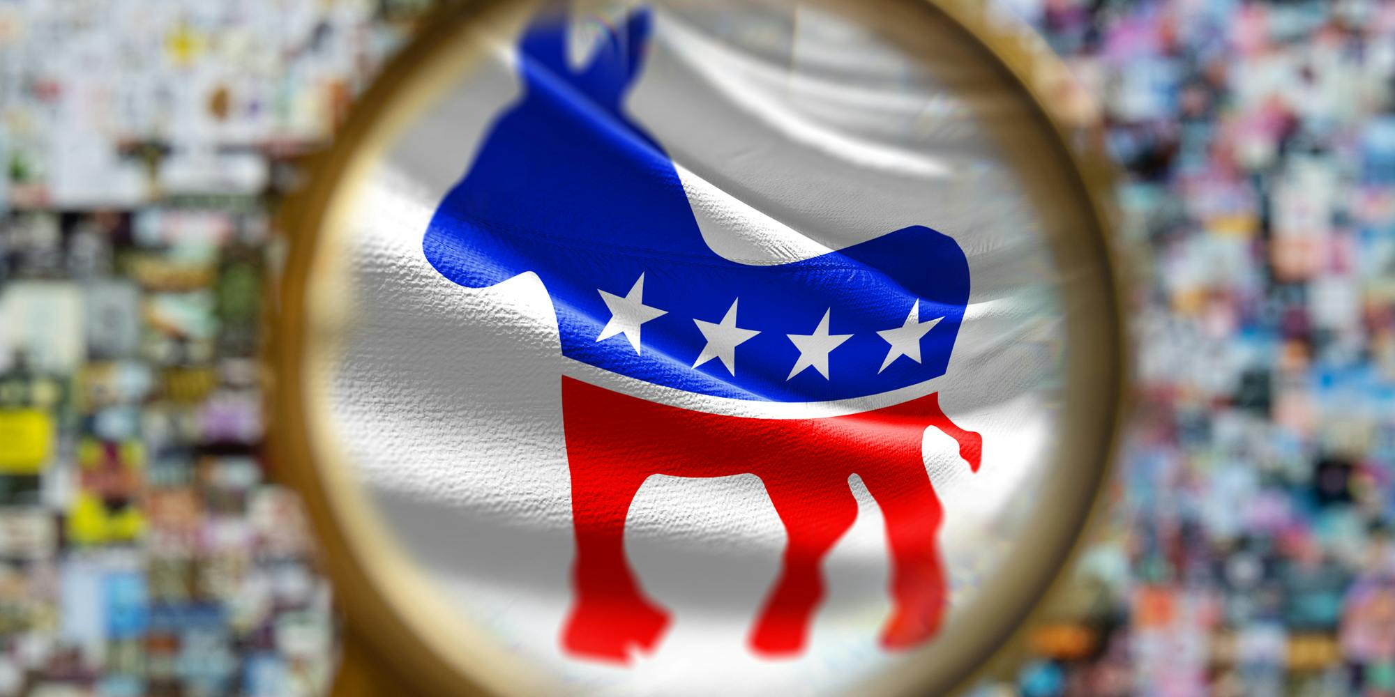 Magnifying glass over Democratic logo