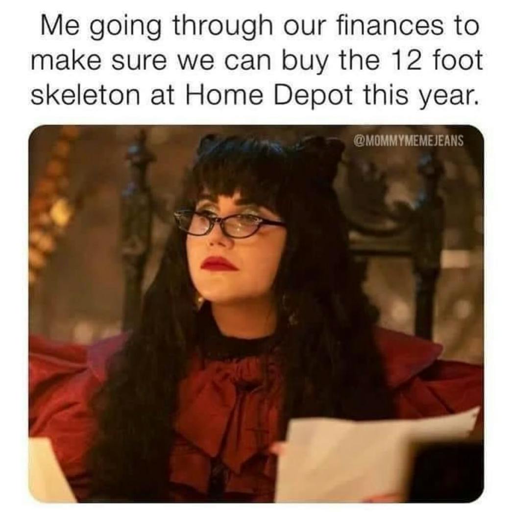 Fall meme that says, 'Me going through our finances to make sure we can buy the 12 foot skeleton at Home Depot this year.' With a photo from 'What We Do in the Shadows' of vampire Nadja.