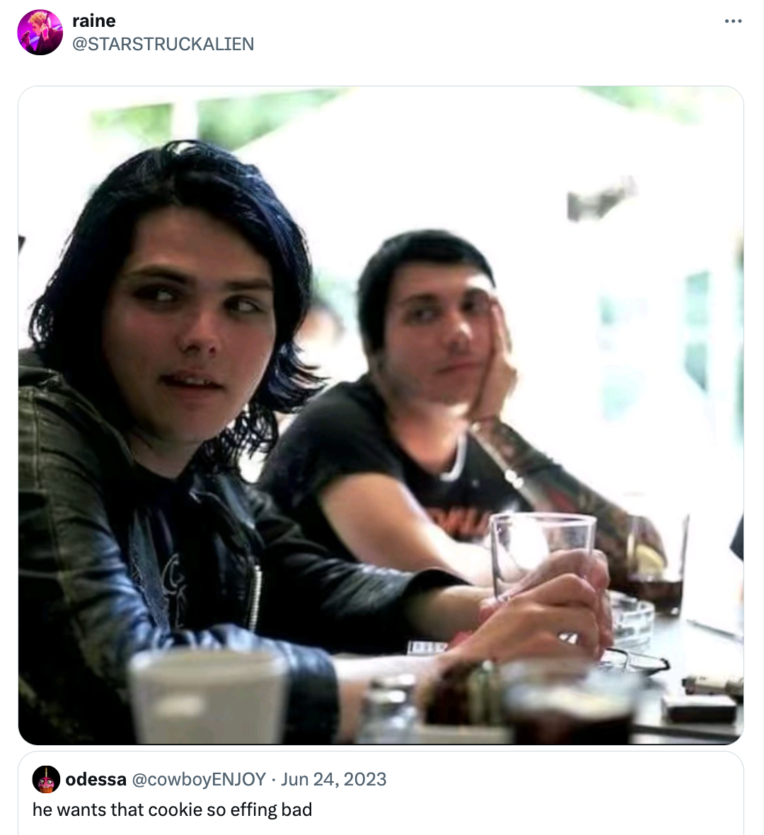 Frank Iero from My Chemical Romance staring longingly at Gerard Way from behind, similar to the 'he wants that cookie so bad' meme.