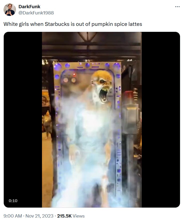 Pumpkin spice latte meme with a video of a Halloween decoration that's a thrashing corpse.