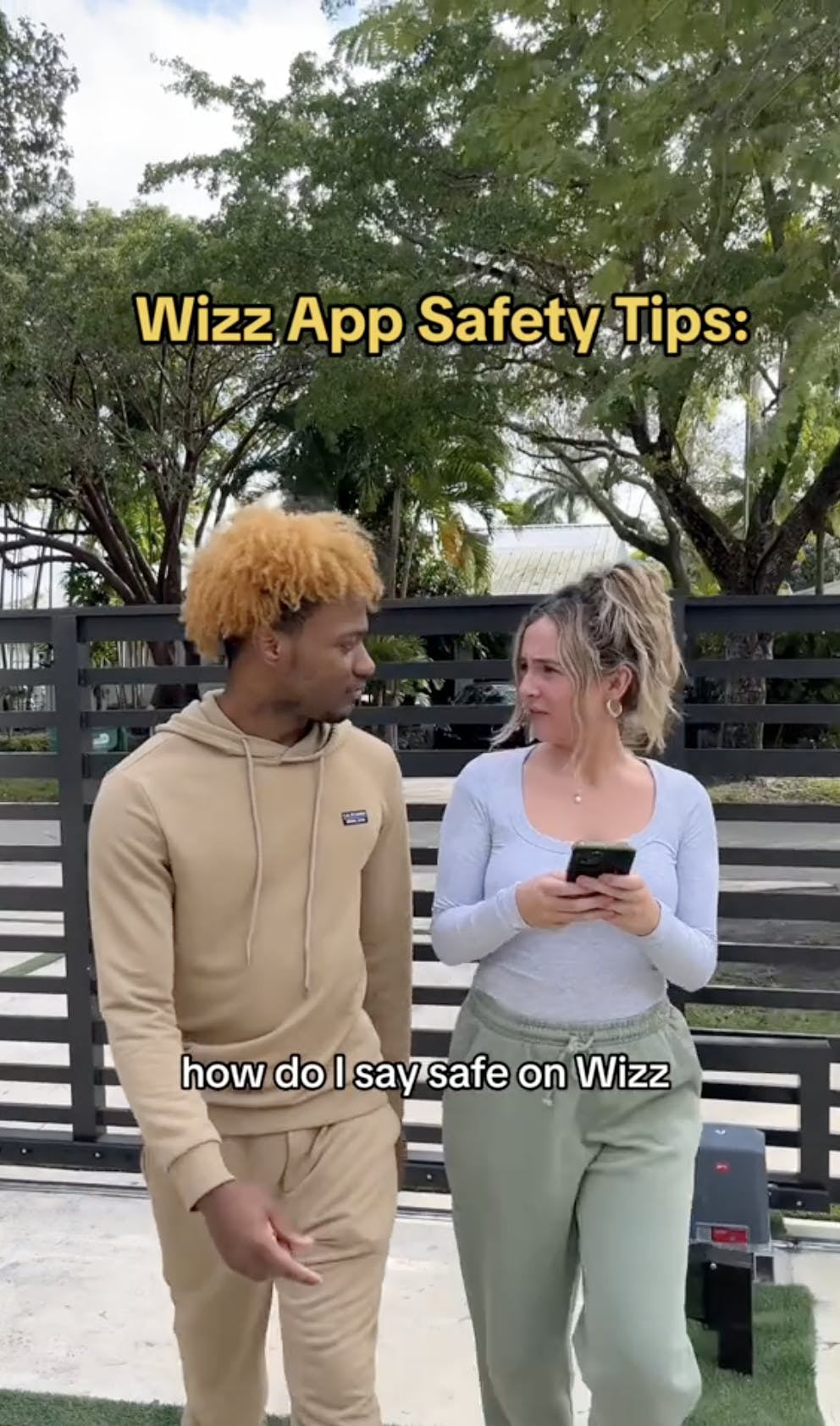 Two people talking while walking. Text overlay says, 'Wizz App Safety Tips:' and 'how do I stay safe on Wizz'