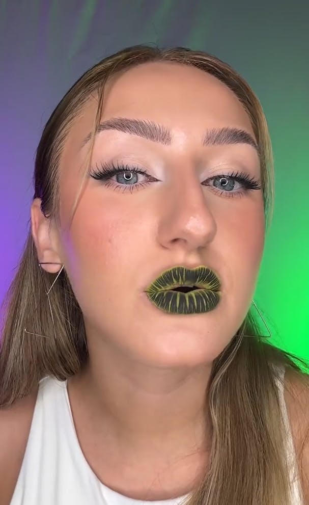 Beetlejuice lips on Katie Farhood.