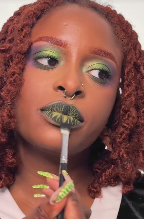 Beetlejuice lips on Ronke Raji.