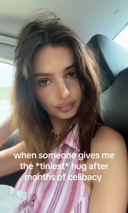 Boysober TikTok of a woman staring at the camera from the back of a car. Text overlay says, 'when someone gives me the *tiniest* hug after months of celibacy.'