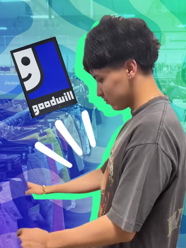 man at Goodwill with sign over purple and green