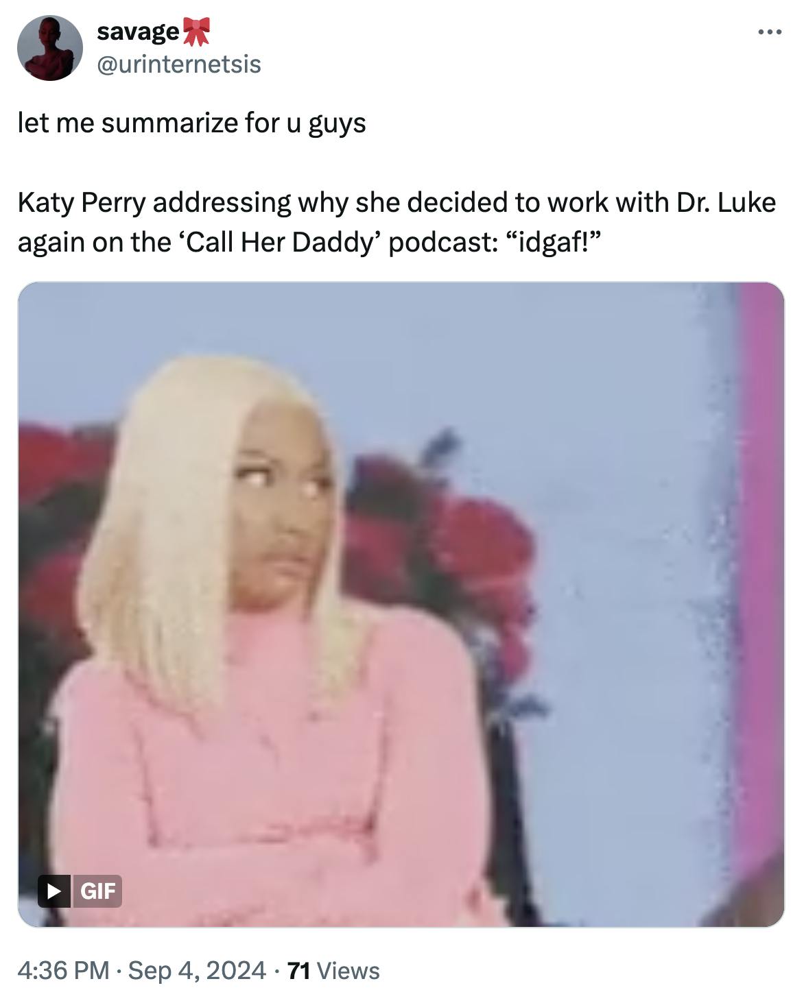 Tweet that reads, 'let me summarize for u guys Katy Perry addressing why she decided to work with Dr. Luke again on the ‘Call Her Daddy’ podcast: 'idgaf!'” with a GIF of Nicki Minaj in a pink turtleneck pouting and looking off to the side.