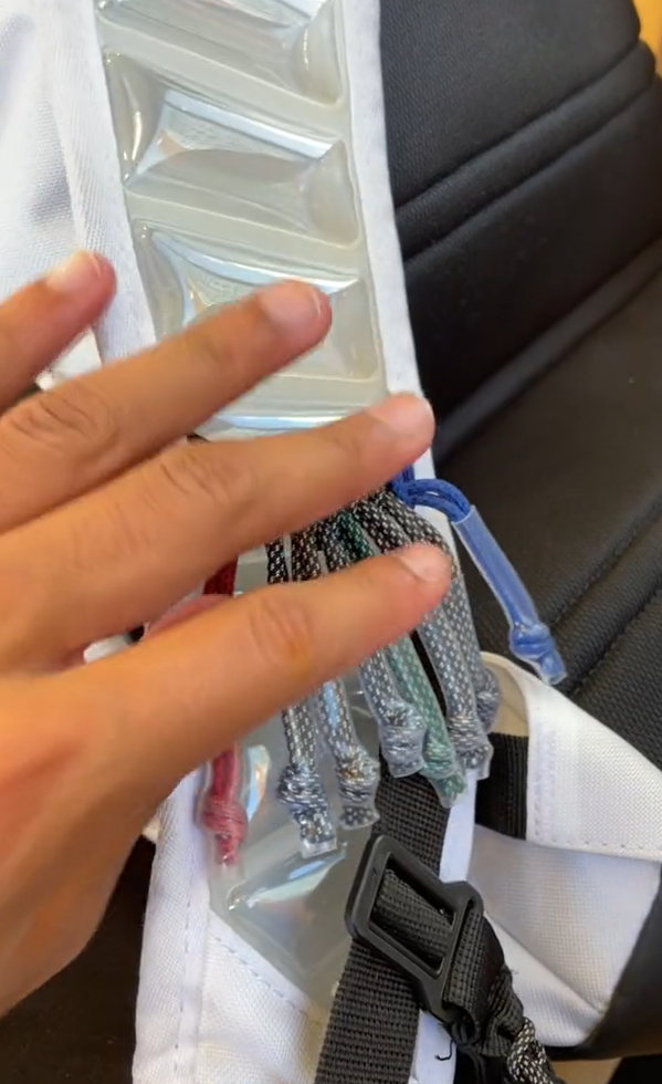 Nike Elite zipper trend video showing several accessories on a backpack.