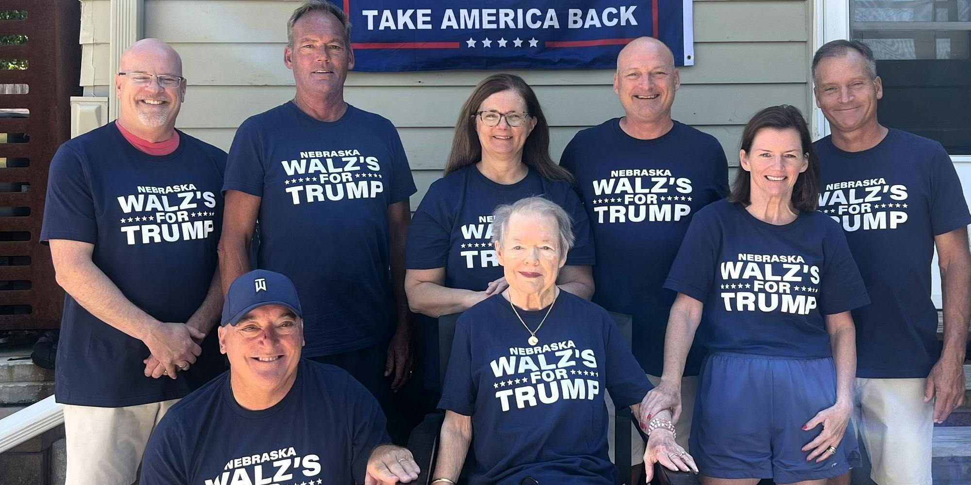 Group of people with "Nebraska Walz's for Trump" tshirts