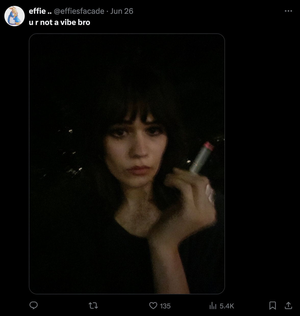 An X post subtweeting a blurry image of a woman with a cigarette. The caption says 'U R Not A Vibe Bro'