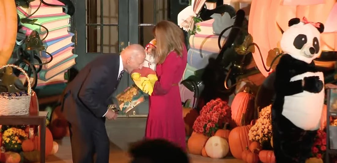 biden biting children