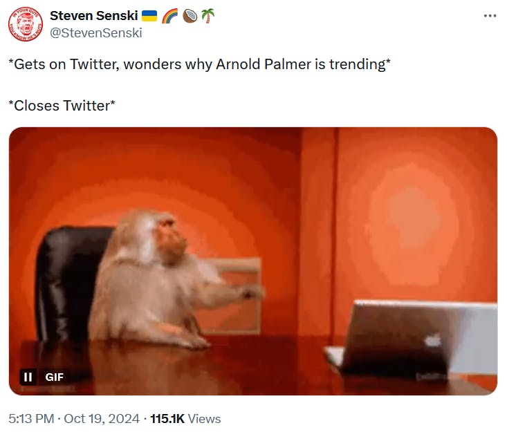 Tweet with the gif of the monkey pushing his laptop off the table.