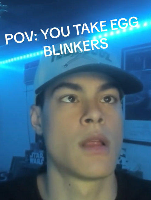 Egg blinker meme showing a man with his eyes crossed.