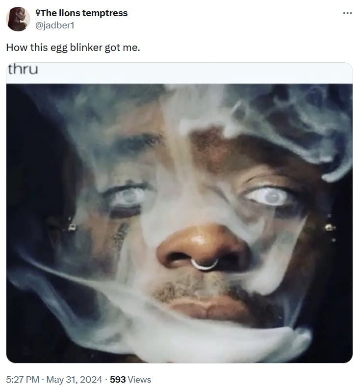 Egg blinker meme with a photo of a man's face shrouded in smoke.