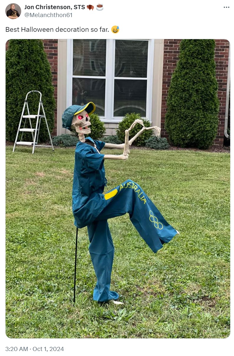 Tweet that reads, 'Best Halloween decoration so far.' with a photo of a skeleton Raygun breakdancing.