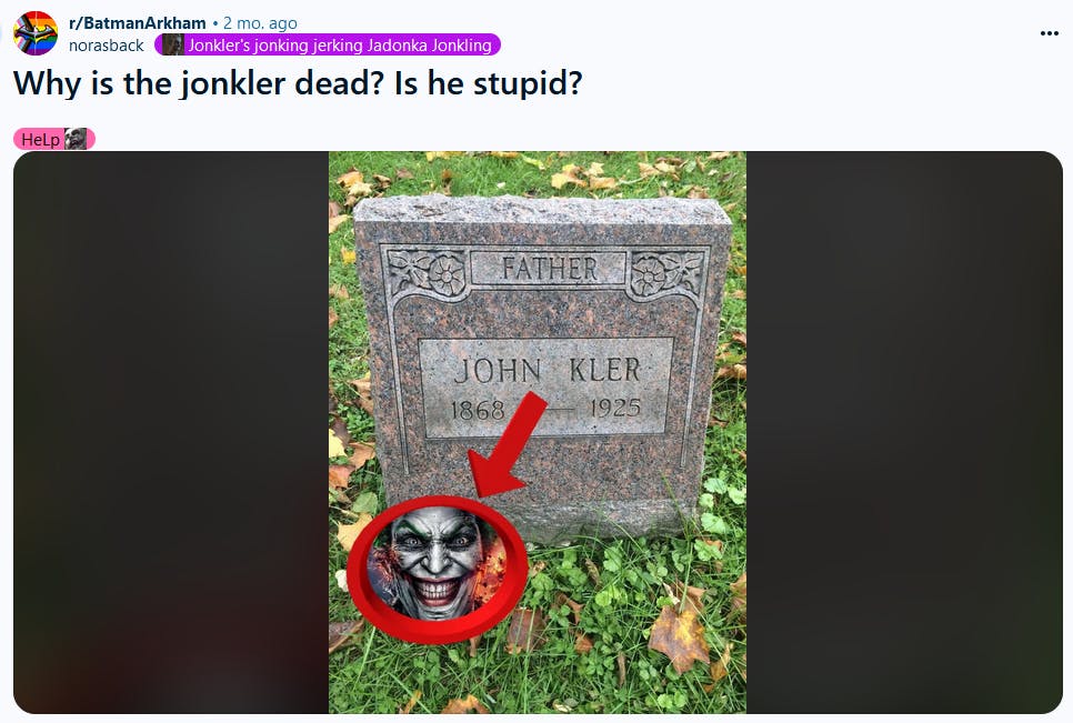 Photo of a gravestone for 'John Kler' pointing to an image of The Joker.