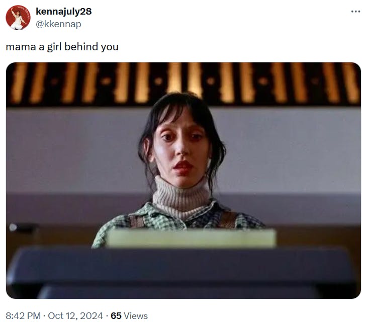 Mama A Girl Behind You meme with the typewriter scene from The Shining.