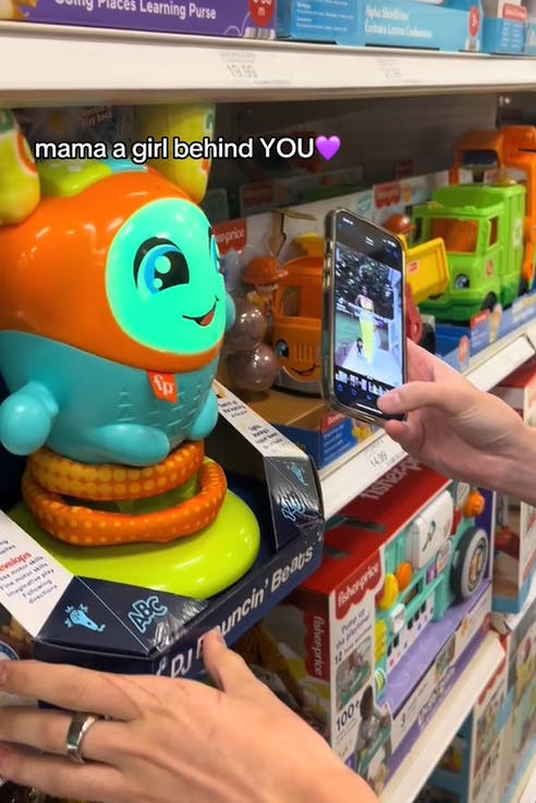 TikTok video in a toy store with a toy that remixes a phrase you say to it into a song.