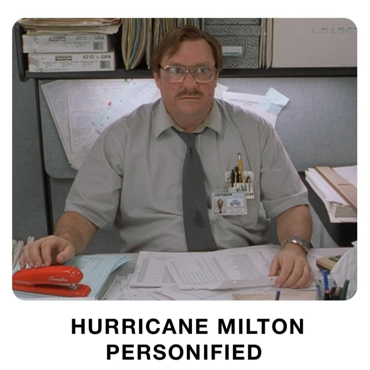 A photo of Milton from Office Space sitting at his desk. The text reads 