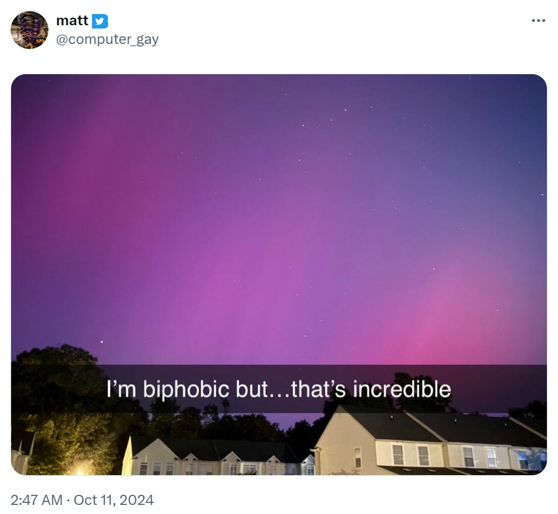 Photo of the northern lights with a Snapchat text filter on top that reads, 'I'm biphobic but...that's incredible.'