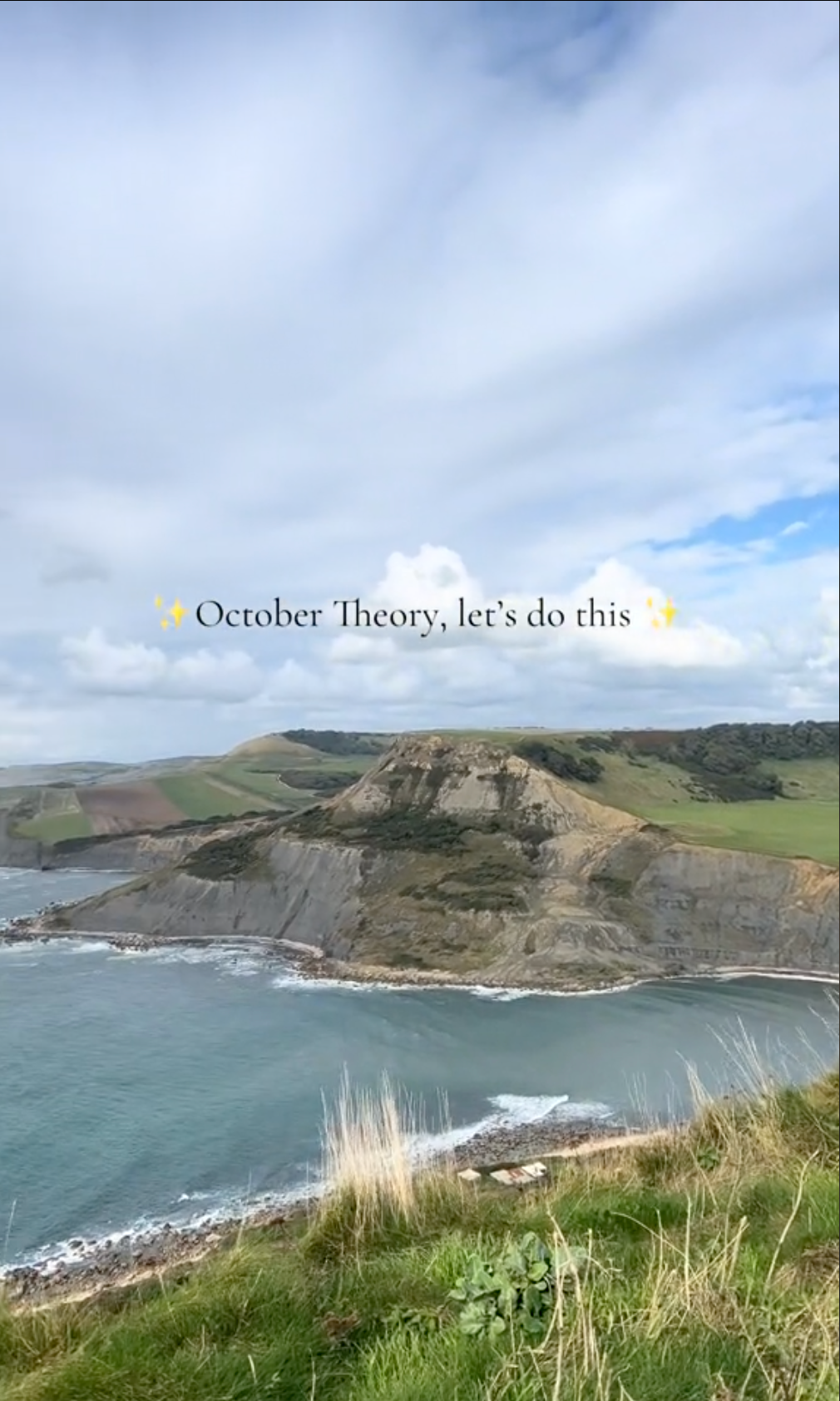 TikTok of a picturesque cliffside walk. Text overlay reads, 'October Theory, let's do this.'