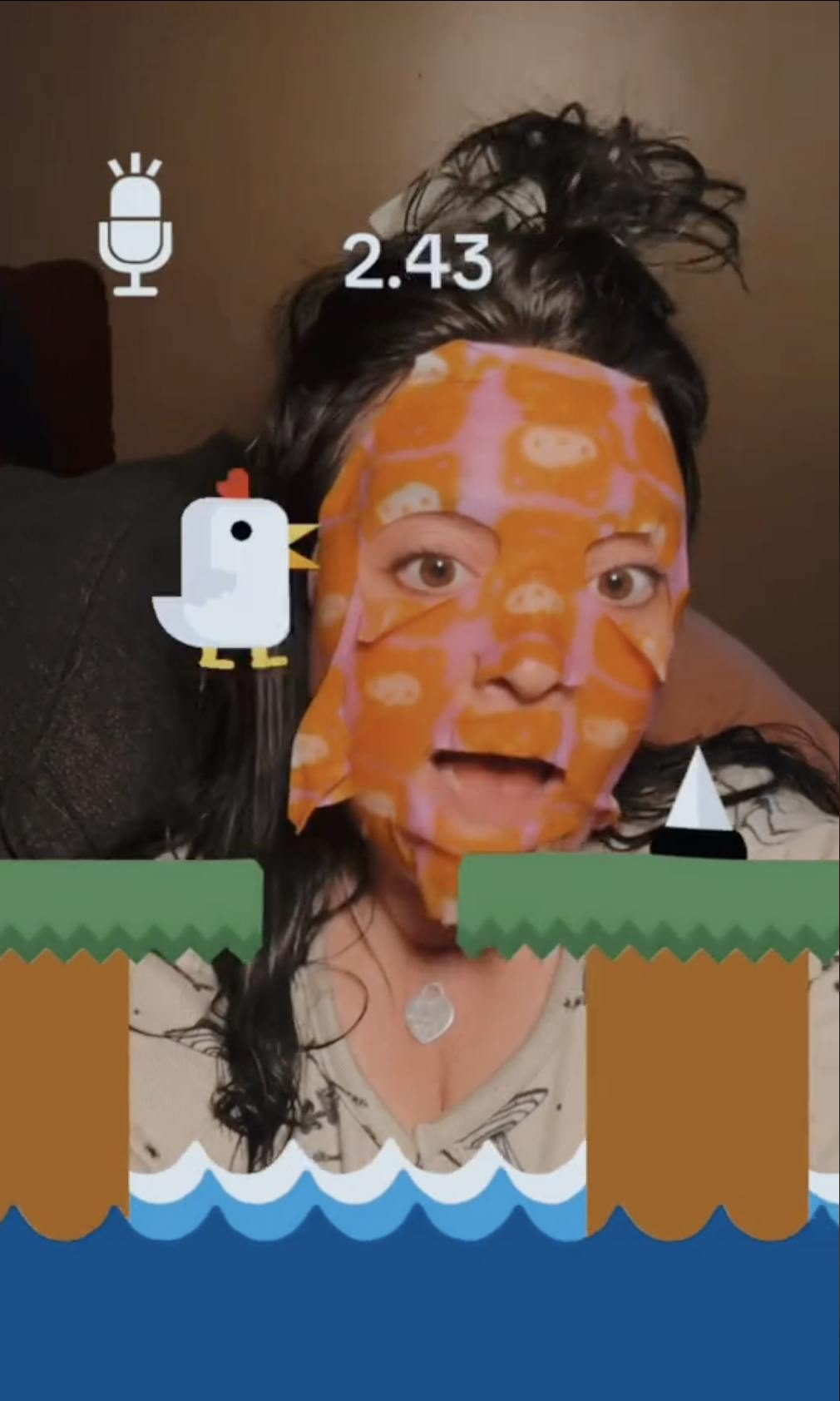 A woman in a face mask participating in the Scream Chicken Game on TikTok.