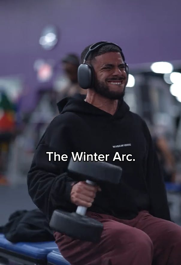 Winter Arc meme with a man lifting a large free weight in a gym.